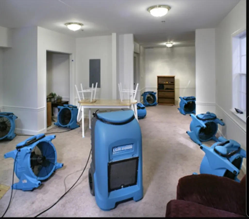 Air movers and dehumidifier setup for Water Damage Restoration in Leonia